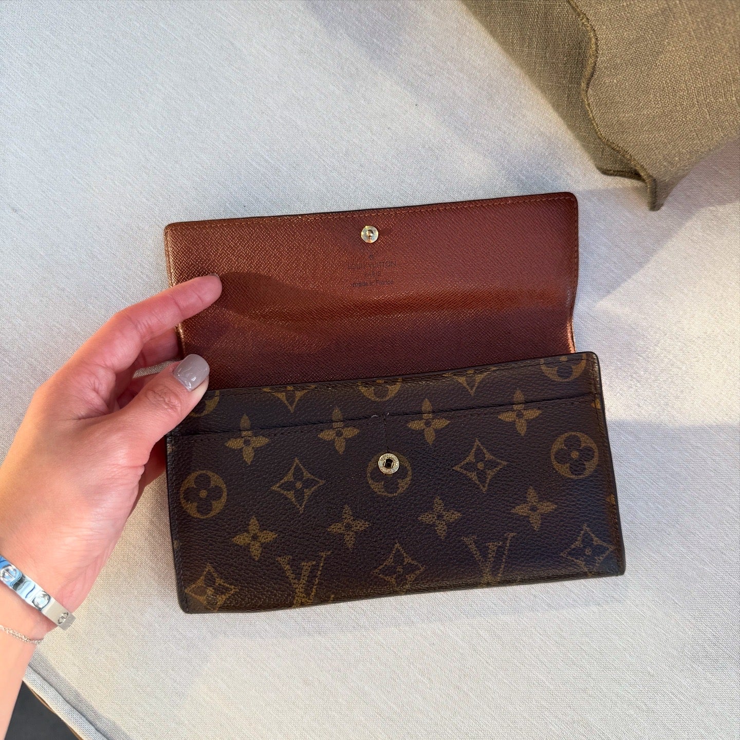 Louis Vuitton Sara Monogram Trifold Wallet