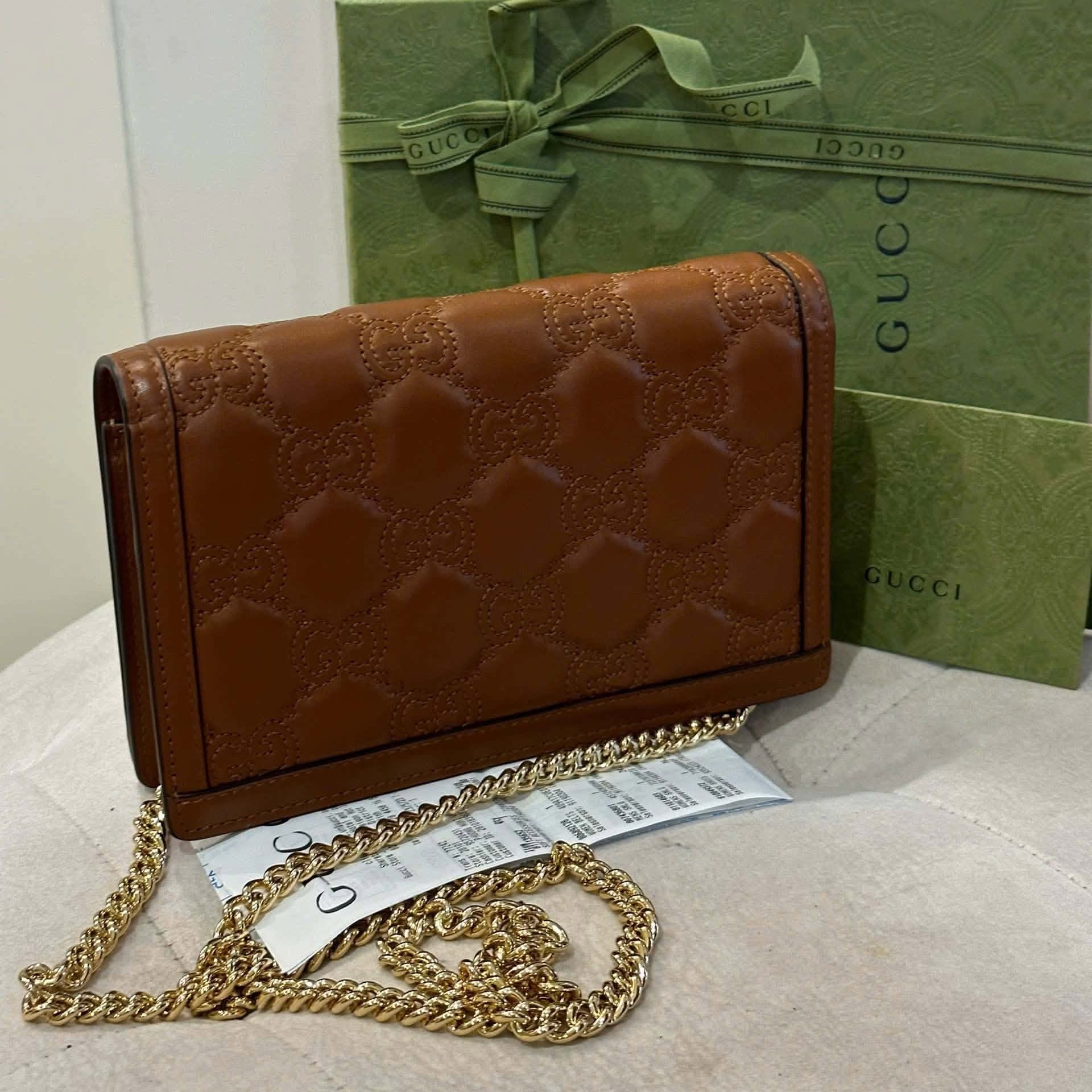 Gucci GG Matelasse Chain Wallet in Brown