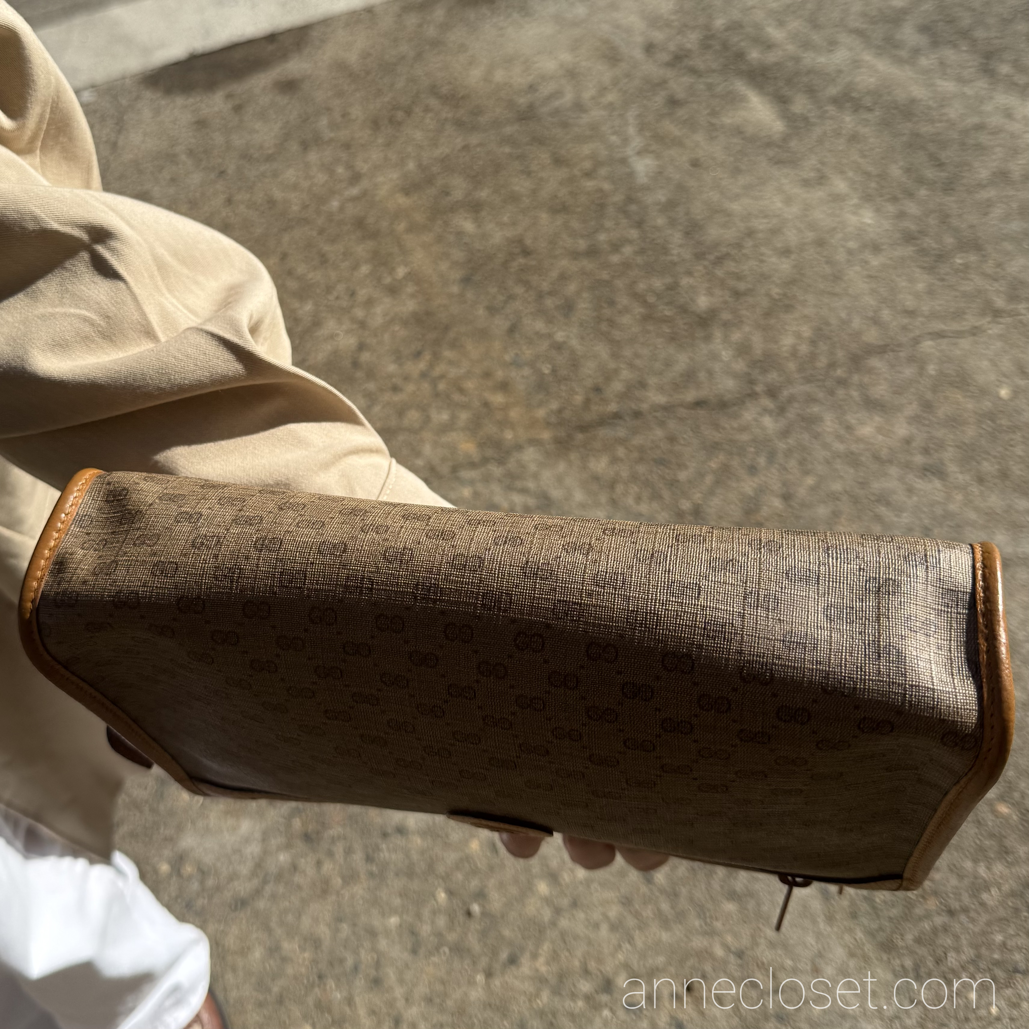 GUCCI Micro GG Supreme Clutch Bag