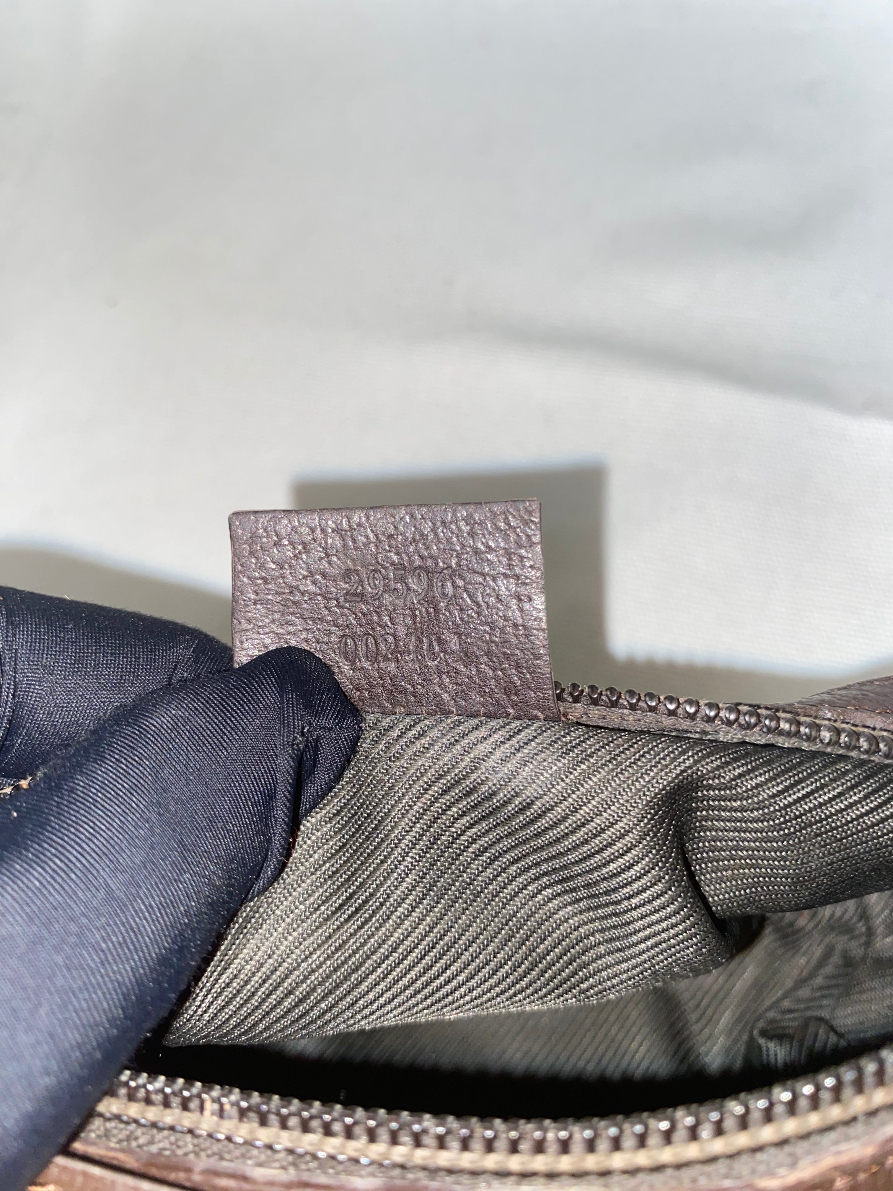 Gucci Pochette GG Canvas Mini