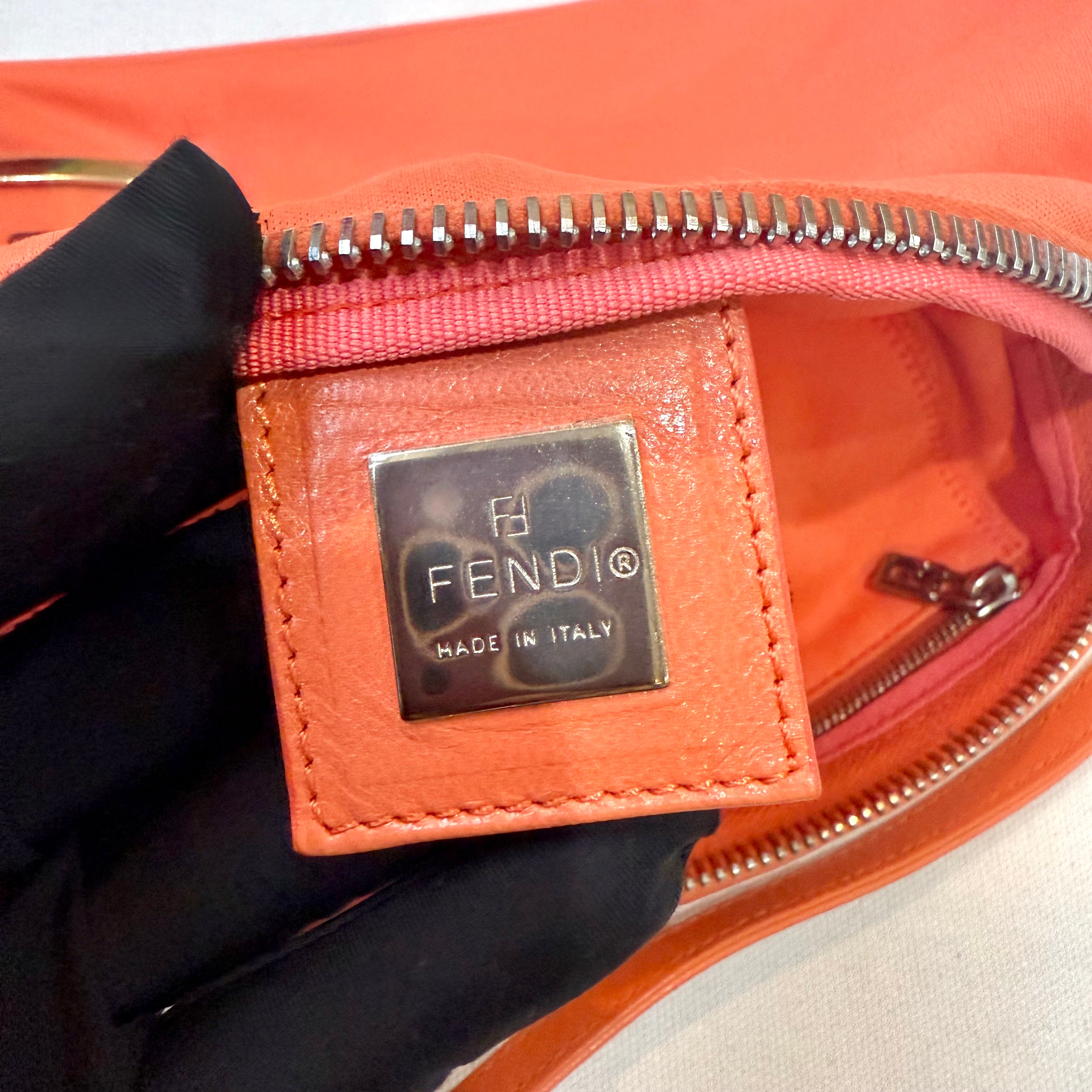 Fendi Orange Baguette Handbag Metal Logo