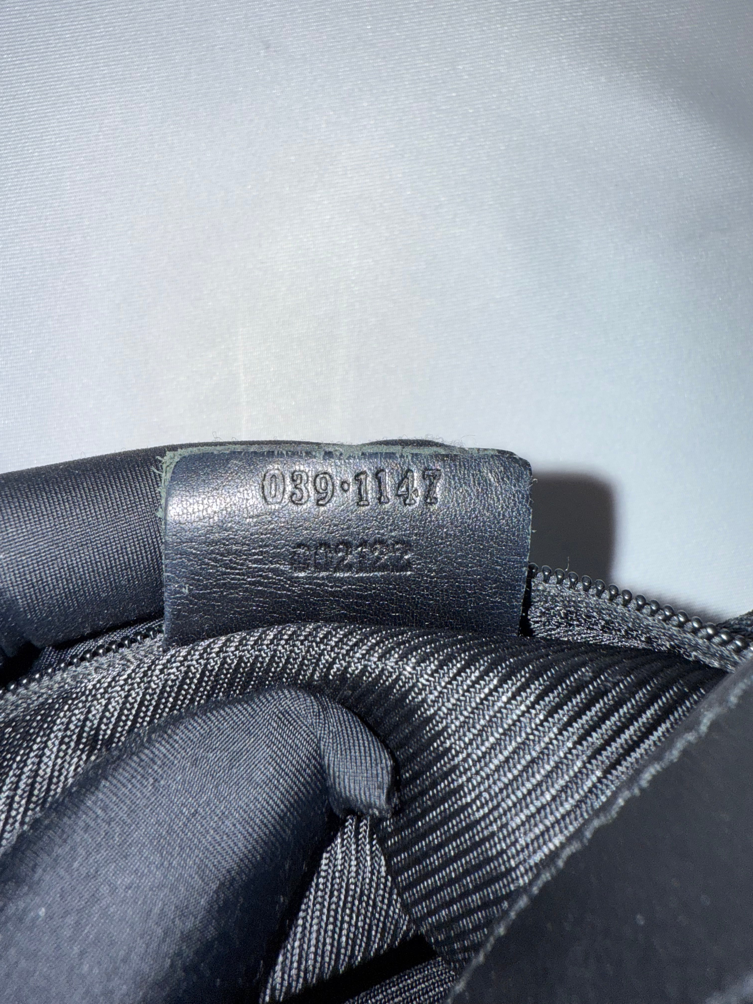 Gucci GG Canvas Pochette