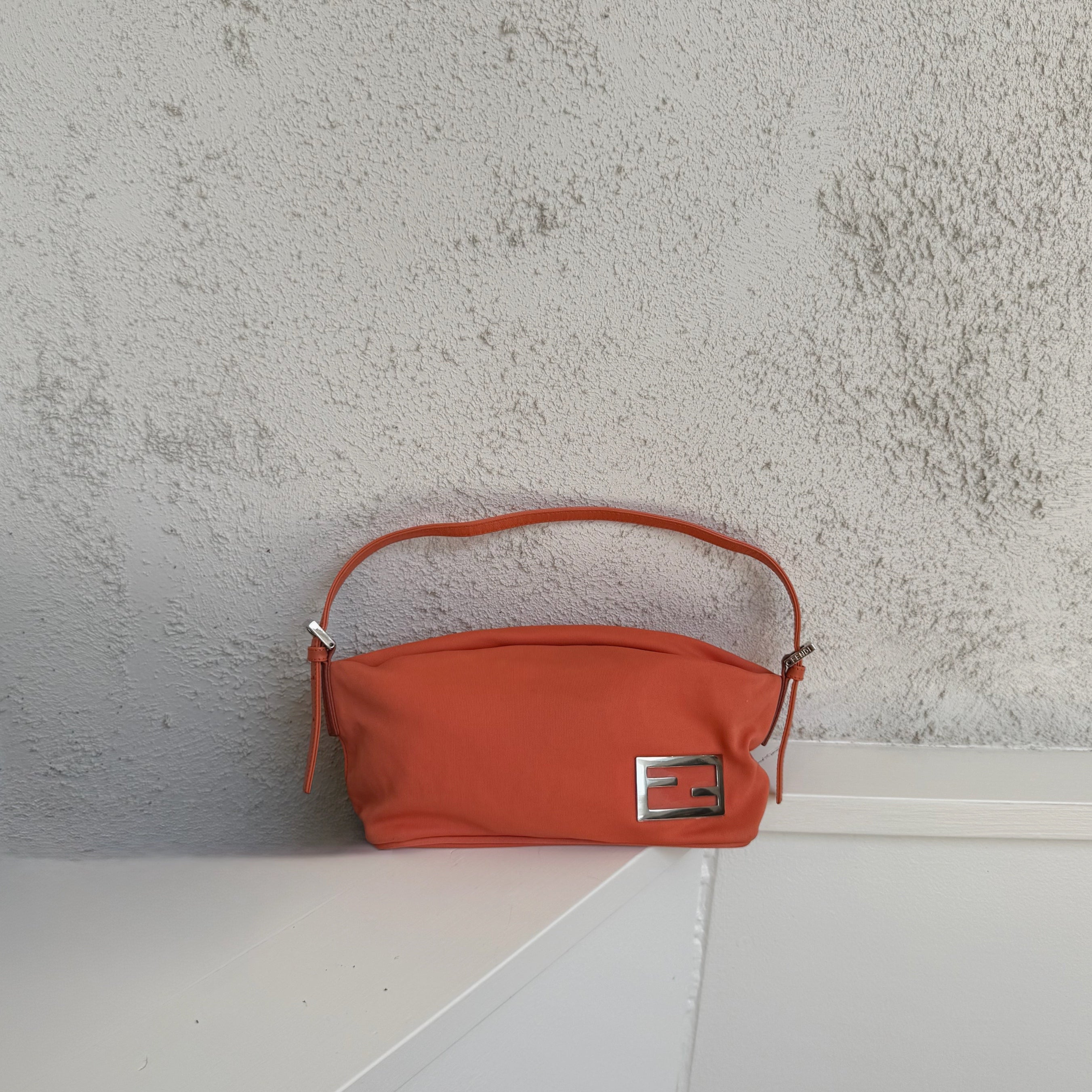 Fendi Orange Baguette Handbag Metal Logo