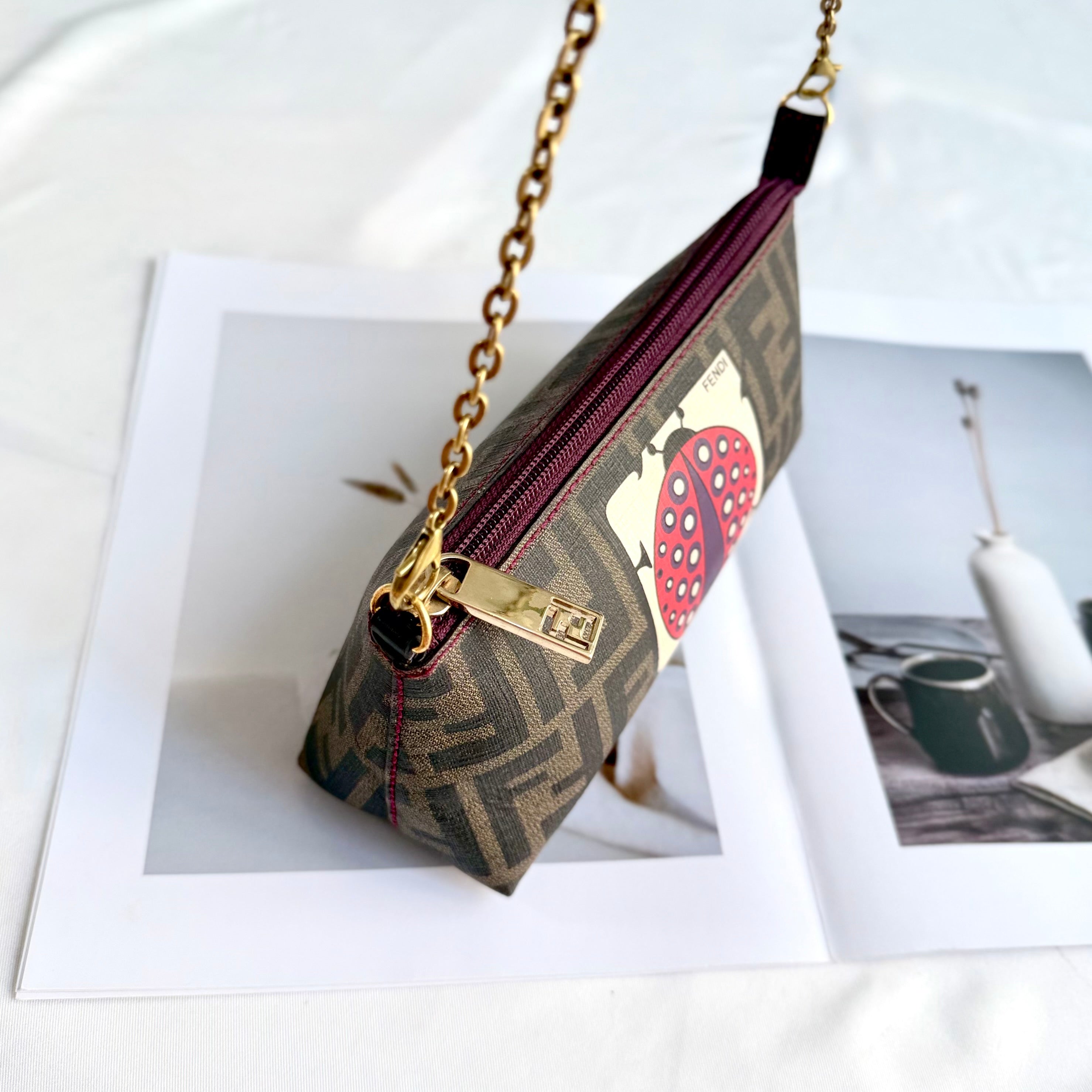 Fendi Limited Edition Zucca Spalmati Ladybug Pochette