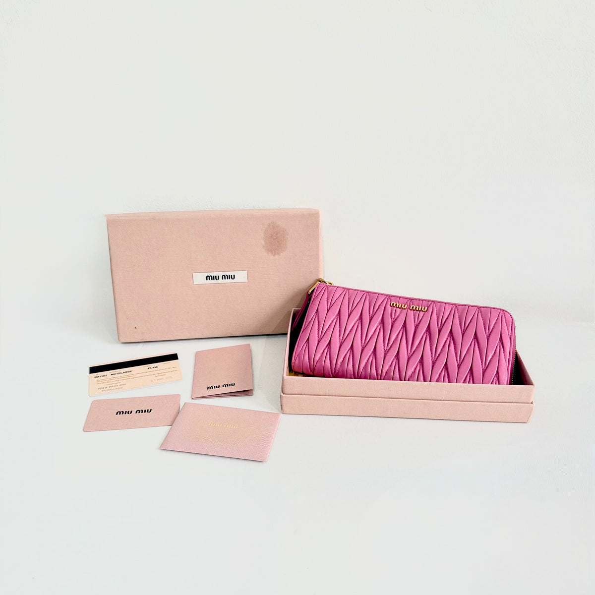 Miu Miu Pink Matelasse Leather Wallet Round Zipper