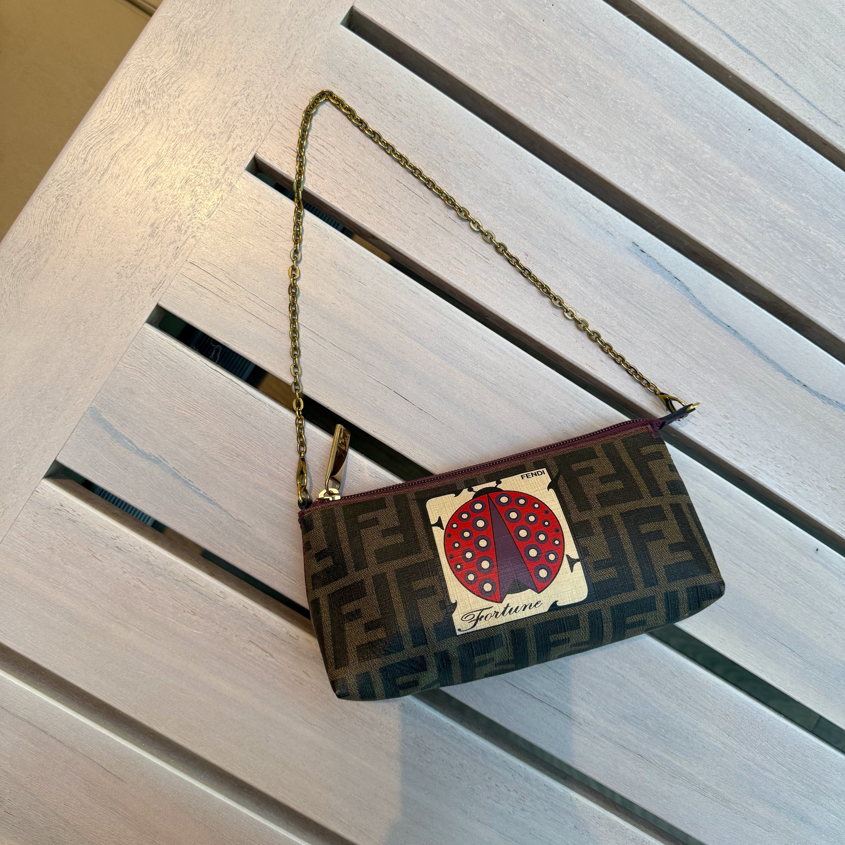 Fendi Limited Edition Zucca Spalmati Ladybug Pochette