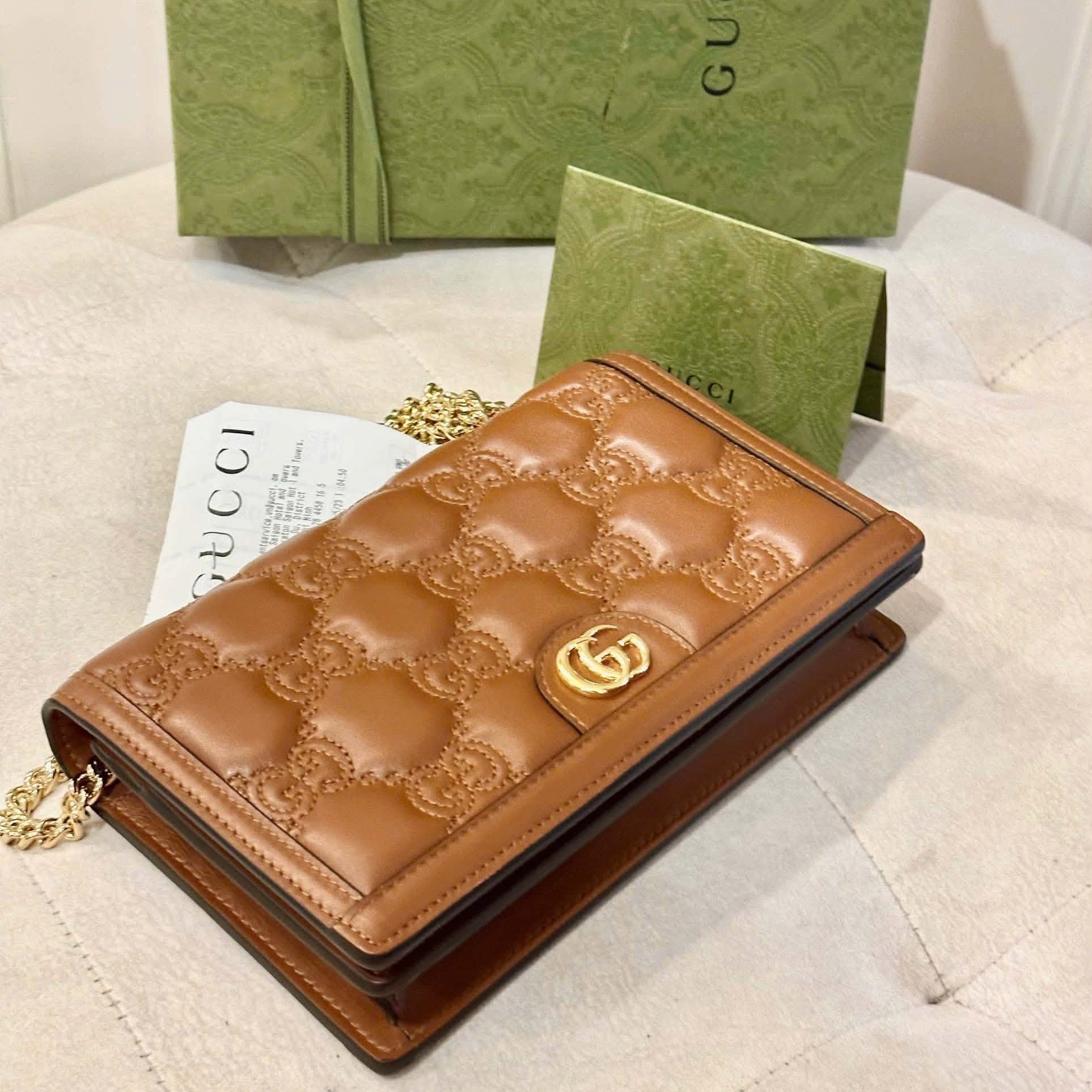 Gucci GG Matelasse Chain Wallet in Brown