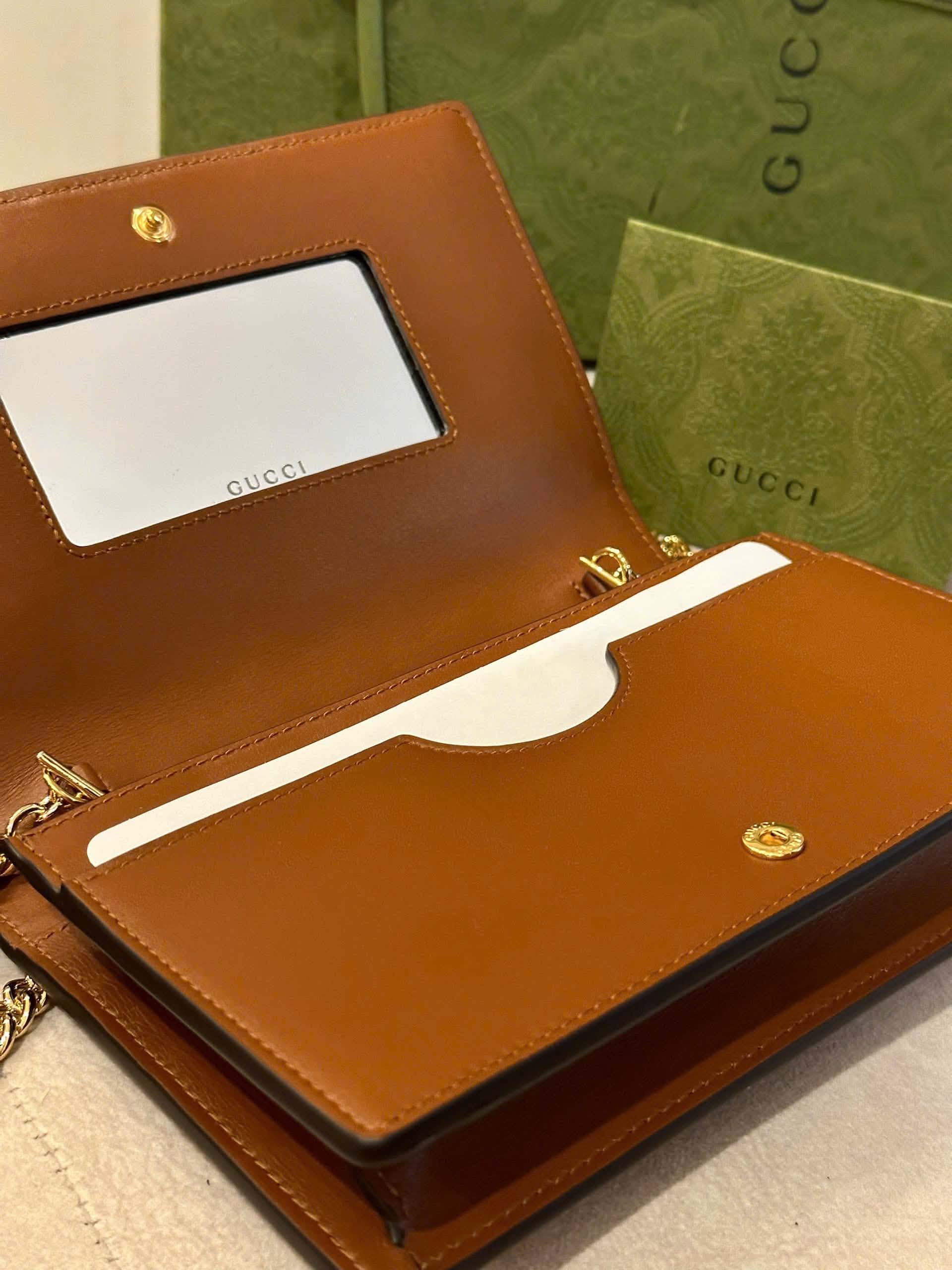 Gucci GG Matelasse Chain Wallet in Brown