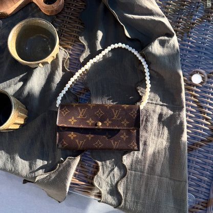 Louis Vuitton Sara Monogram Trifold Wallet