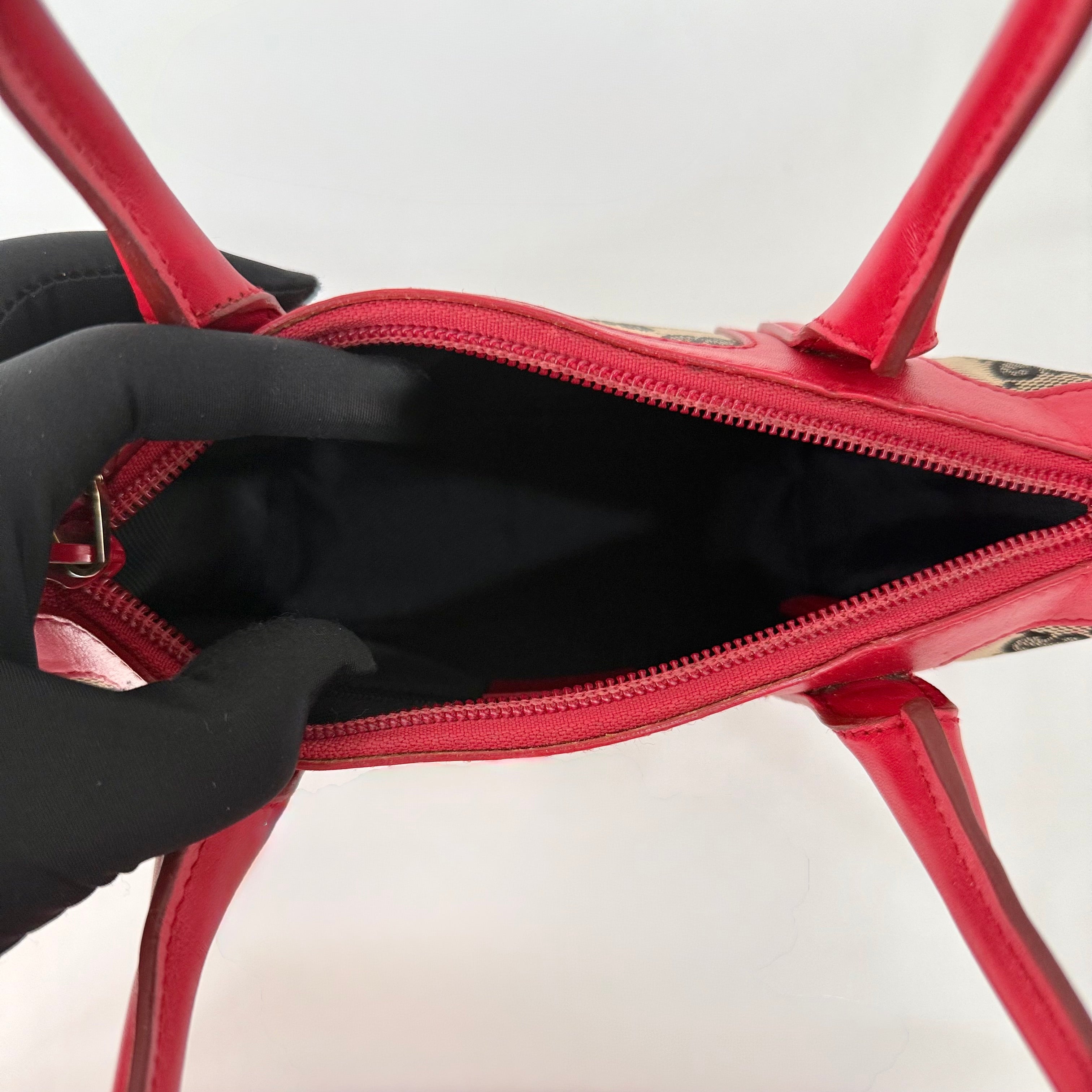 Gucci Red GG Canvas handbag