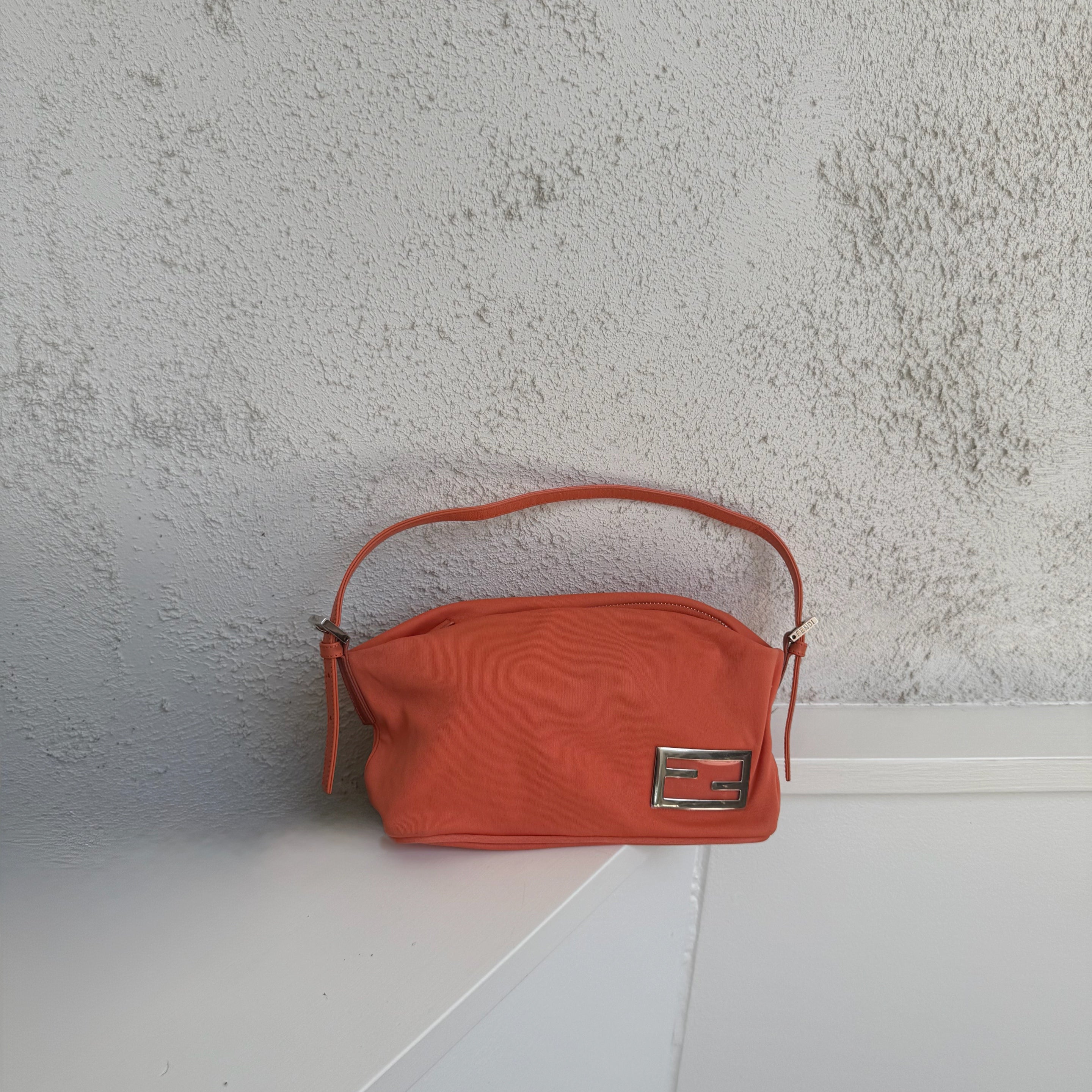 Fendi Orange Baguette Handbag Metal Logo
