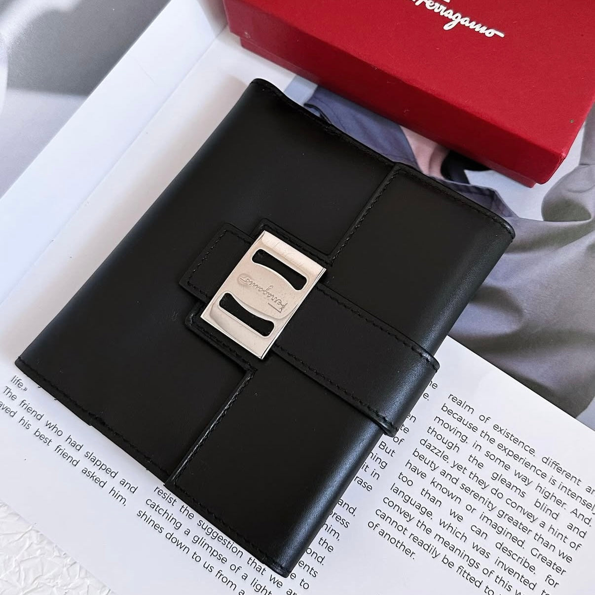 Salvatore Ferragamo Black leather bi-fold long wallet
