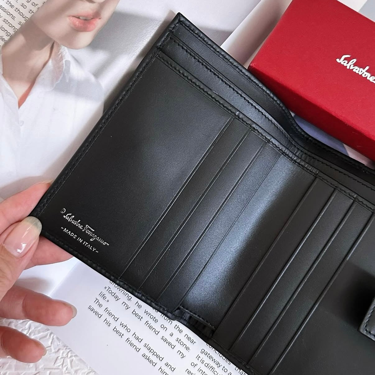 Salvatore Ferragamo Black leather bi-fold long wallet