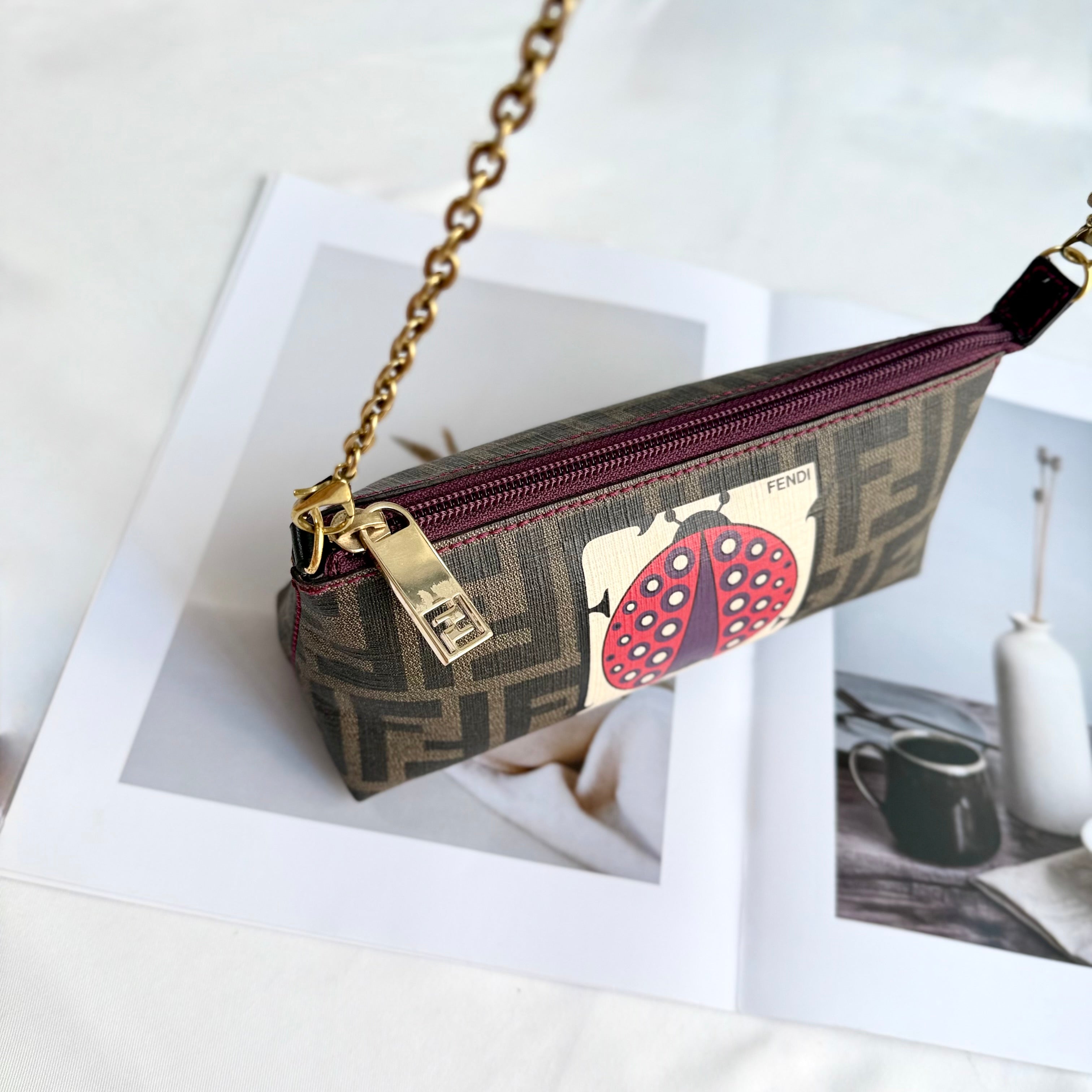 Fendi Limited Edition Zucca Spalmati Ladybug Pochette