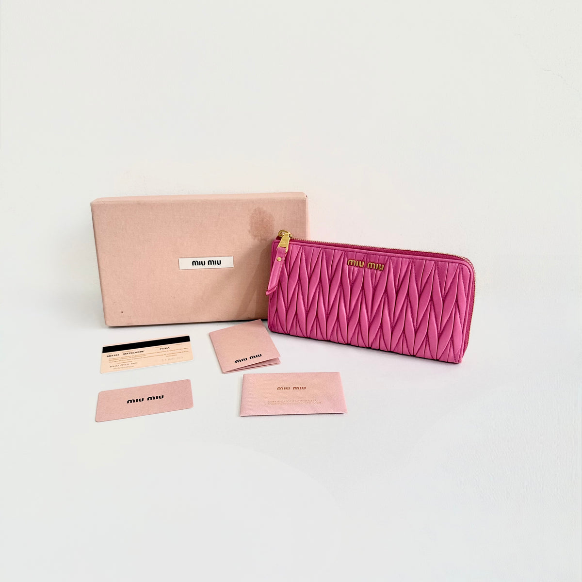 Miu Miu Pink Matelasse Leather Wallet Round Zipper